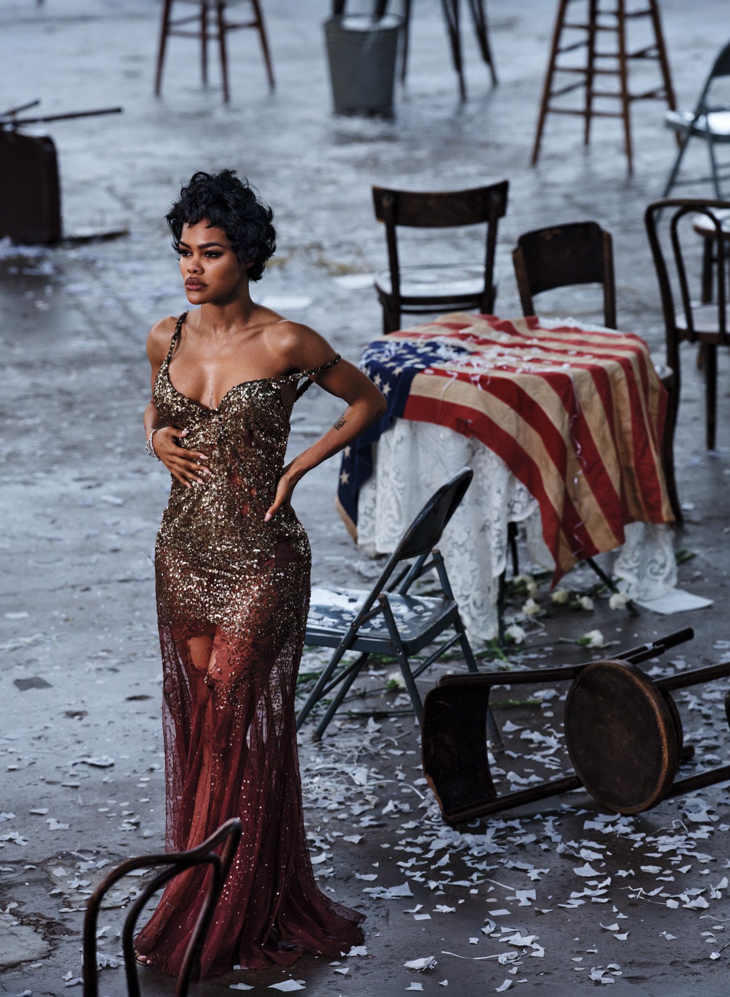 Image may contain Teyana Taylor Clothing Dress Formal Wear Evening Dress Adult Person Chair Furniture and Aircraft