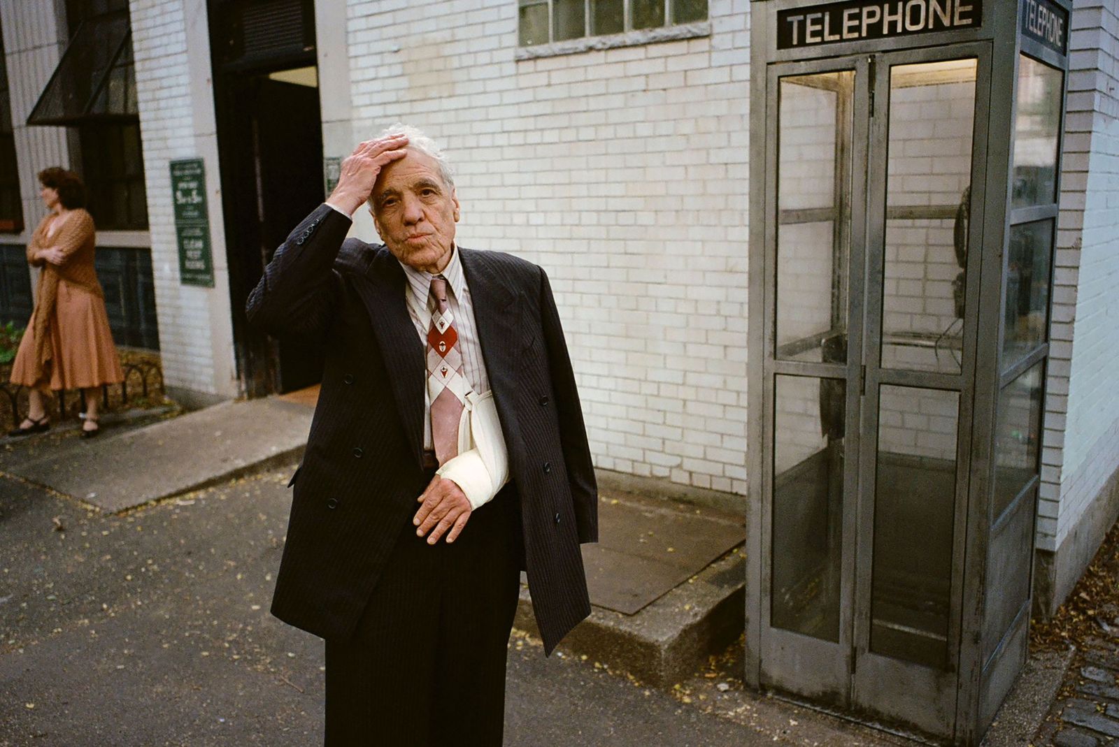 Image may contain Abel Ferrara Person Senior Citizen Clothing Coat and Adult