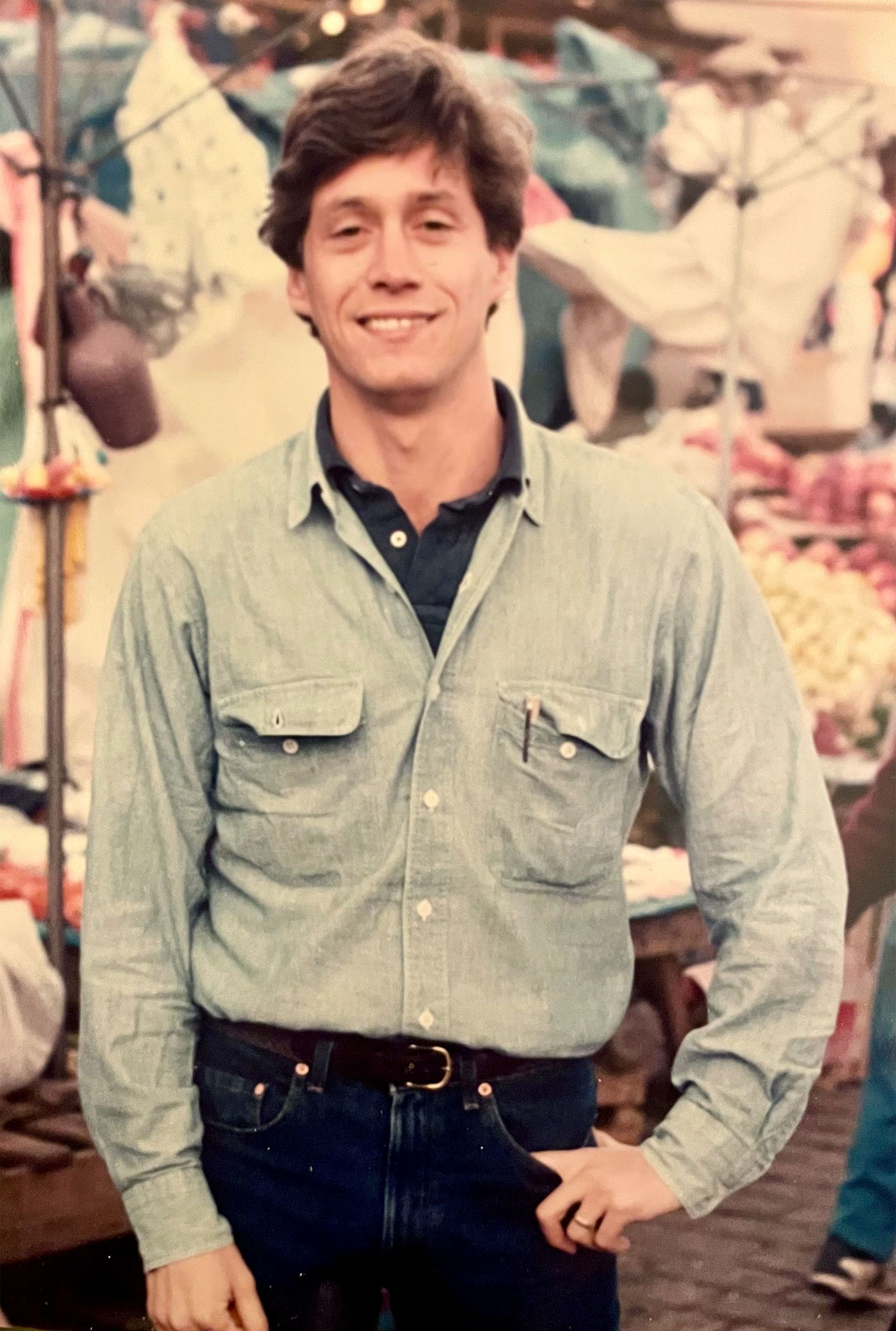 Image may contain Brian Grazer Clothing Pants Face Happy Head Person Smile Sleeve Photography Portrait and Shirt